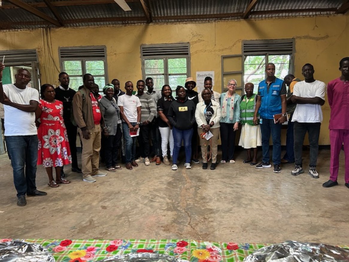 Group of people standing inside the Ethiopian Community Library.