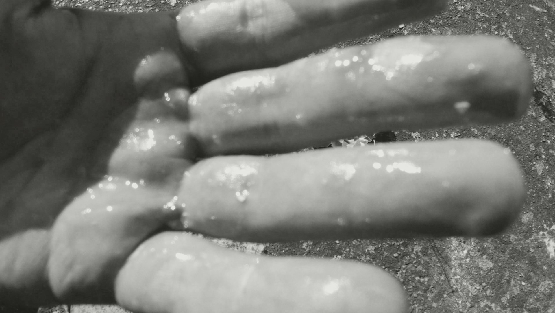 Video still of close up of wet hand