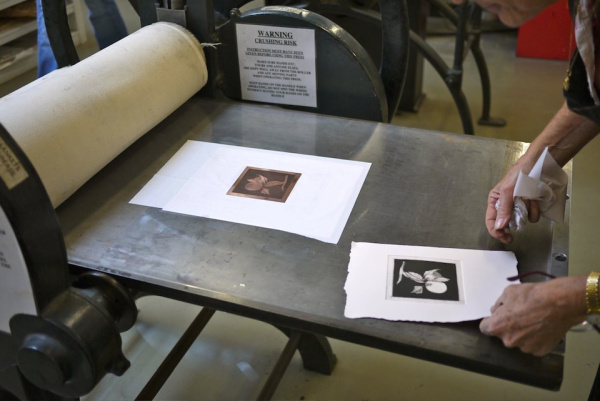 Two images on a printing press.